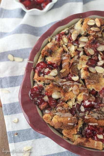 This Chocolate Almond Cherry Bread Pudding is baked to perfection with layers of chocolate almond milk-soaked bread, cherry pie filling and sprinkled with sliced almonds.
