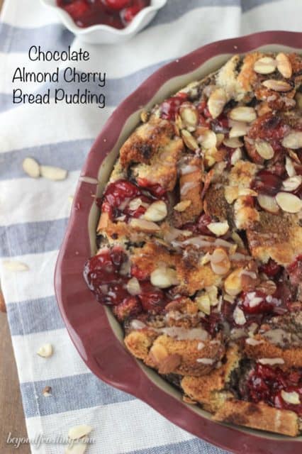 This Chocolate Almond Cherry Bread Pudding is baked to perfection with layers of chocolate almond milk-soaked bread, cherry pie filling and sprinkled with sliced almonds.