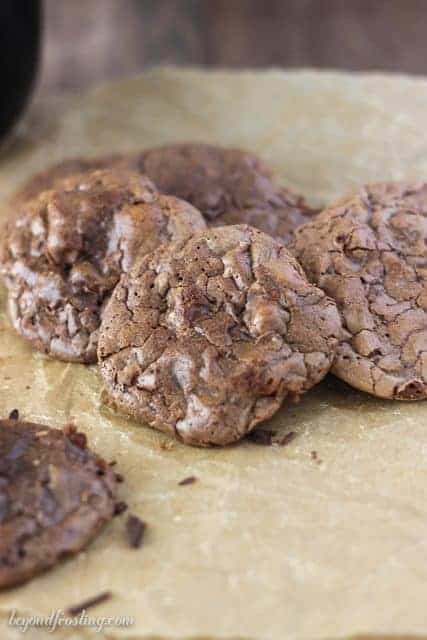 These Triple Chocolate Truffle Cookies are a chocolate lover’s dream. Crispy on the outside and gooey in the middle, these brownie-like cookies are inspired by a cookie from Dahlia’s Bakery in Seattle.