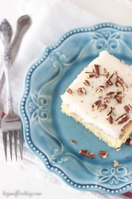 Cinnamon Coffee Cake Poke Cake with a cream cheese glaze. It's coffee cake heaven! 