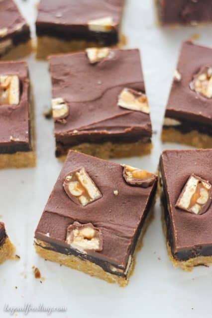 No-Bake Snickers Bars: These No-Bake Snickers Bars start with a thick and crunchy peanut butter base, chocolate Snickers mousse and topped with chocolate ganache and more Snickers.