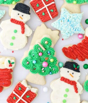 Overhead view of assorted frosted Christmas sugar cookies.