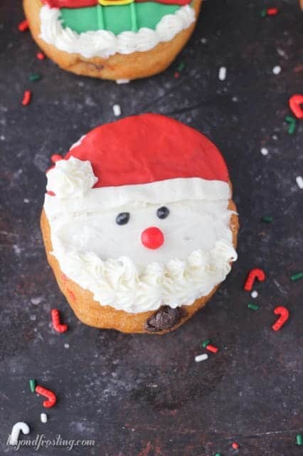 Quick and easy santa donuts filled with chocolate cream.