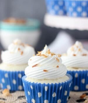 Skinny Coconut Cream Pie Cupcakes- a light coconut cupcake with coconut pudding and whipped cream.