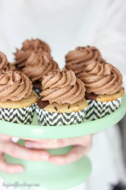There's too much to love about this Triple Irish Cream Cupcakes. This from-scratch recipe is a marbled chocolate and vanilla Irish cream cake filled with a spiked ganache and a Irish Cream Frosting.