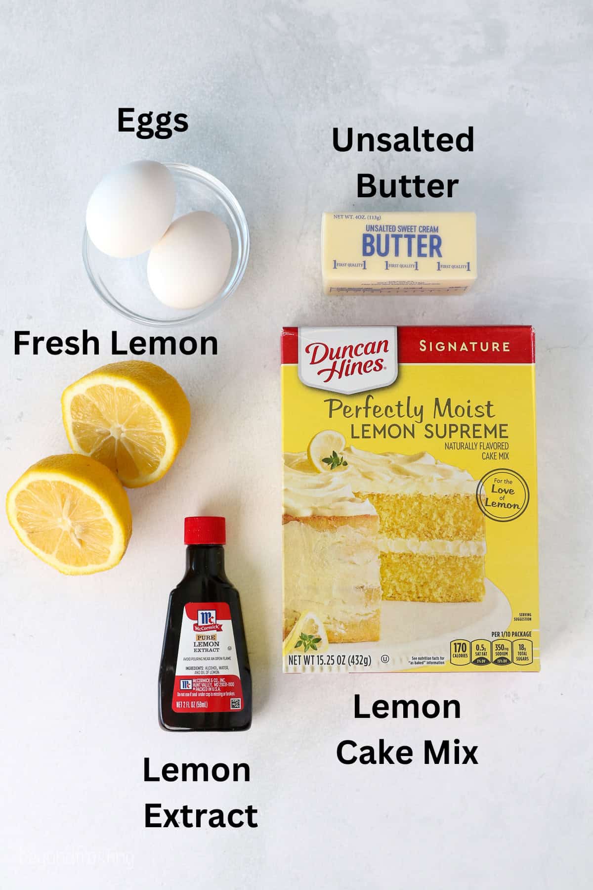 Ingredients for lemon cake mix cookies with text labels overlaying each ingredient.