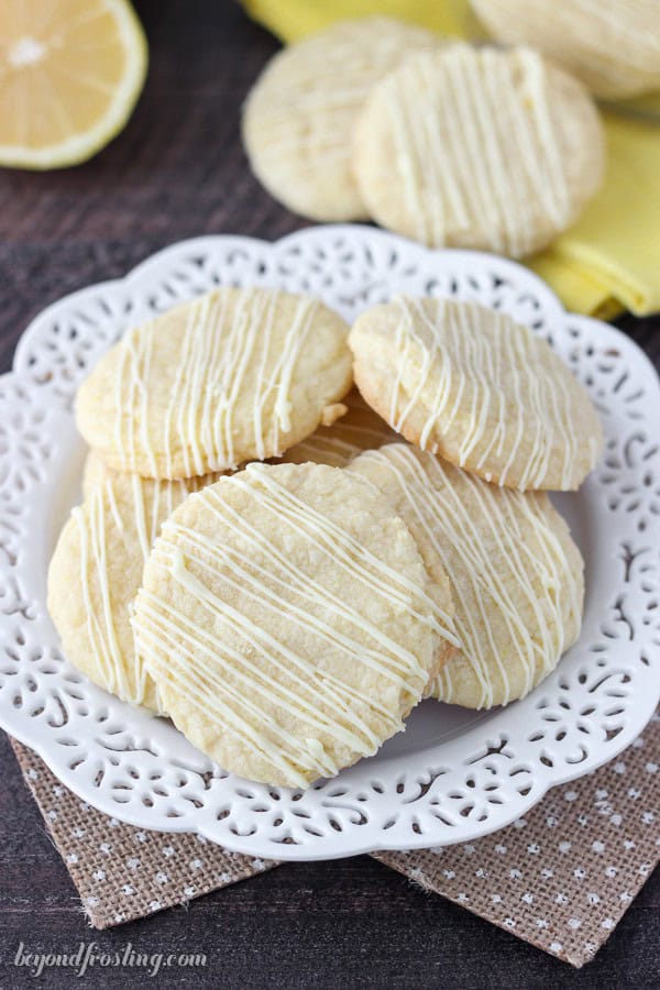 Perfect lemon cake mix cookies drizzled with white chocolate.