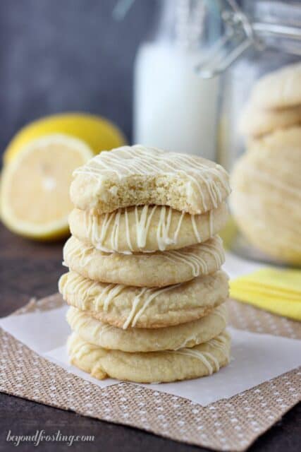 These Lemon Cake Mix Cookies are just what you need to brighten up the day. These lemon infused cookies are make with a lemon cake mix and drizzled with white chocolate.