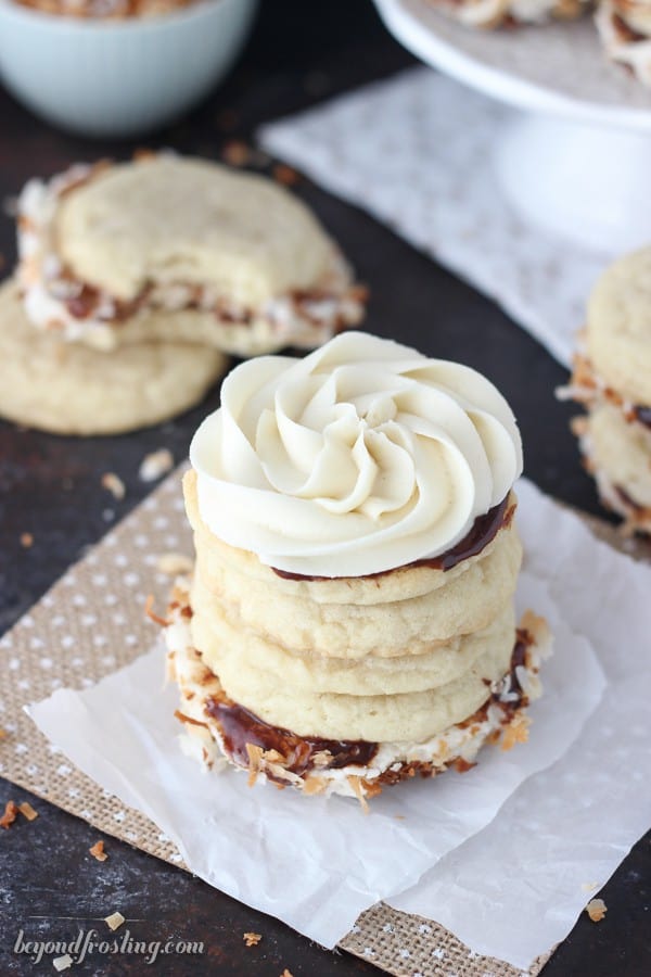 These caramel buttercream stuffed sugar cookies are also coated in hot fudge and rolled in toasted coconut. Get the recipe for Samoa Cookie Sandwiches at beyondfrosting.com