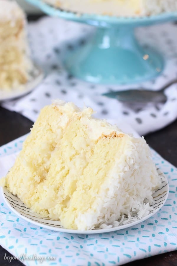 Baked from scratch, this Coconut Custard Cake is layers of coconut cake, with a coconut custard filling and finished with a cream cheese icing.