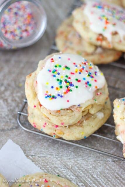 These Frosted Strawberry Pop Tart Cookies are like a party in your mouth. The soft and buttery cookie is loaded with strawberry Pop Tarts and finished off with a vanilla glaze.