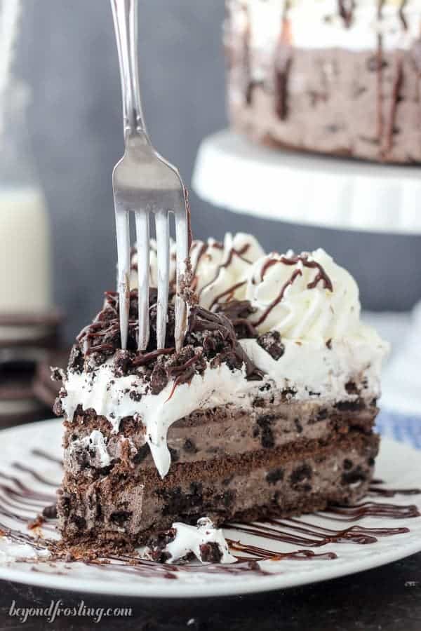 Fork taking a piece out of a slice of icebox cake