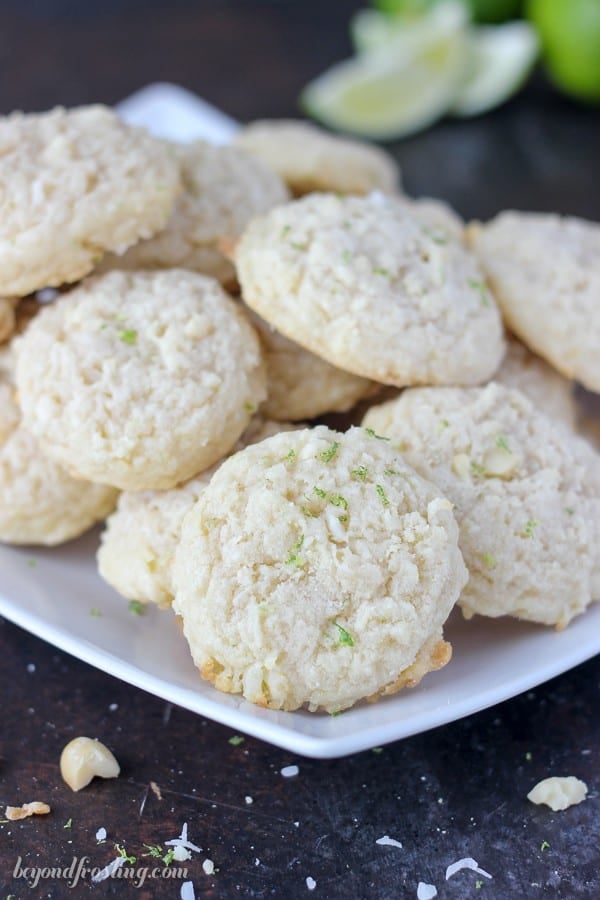 These chunky Coconut Lime Cookies are the perfect summer treat. The soft cookies are loaded with sweetened coconut and lime zest.Grab the recipe at www. beyondfrosting.com