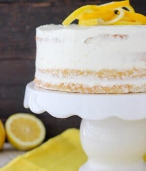 This rich Lemon Olive Oil Cake is covered with a lemon cream cheese whipped cream. The olive oil cake is extra moist and dense in texture. The lightened whipped cream frosting is infused with lemon is the perfect compliment for this cake.