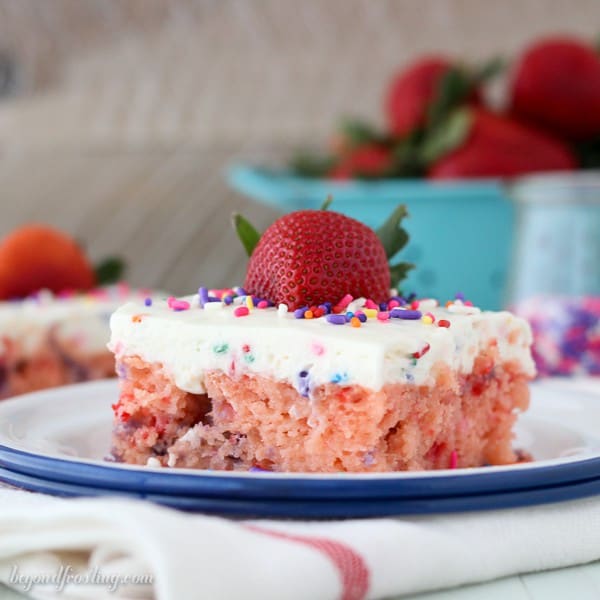 A slice of strawberry cake on a plate