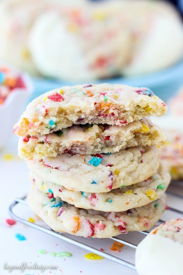 Soft and Chewy Fruity Pebbles Cookies. The buttery sugar cookies are loaded with Fruity Pebbles and dipped in white chocolate.