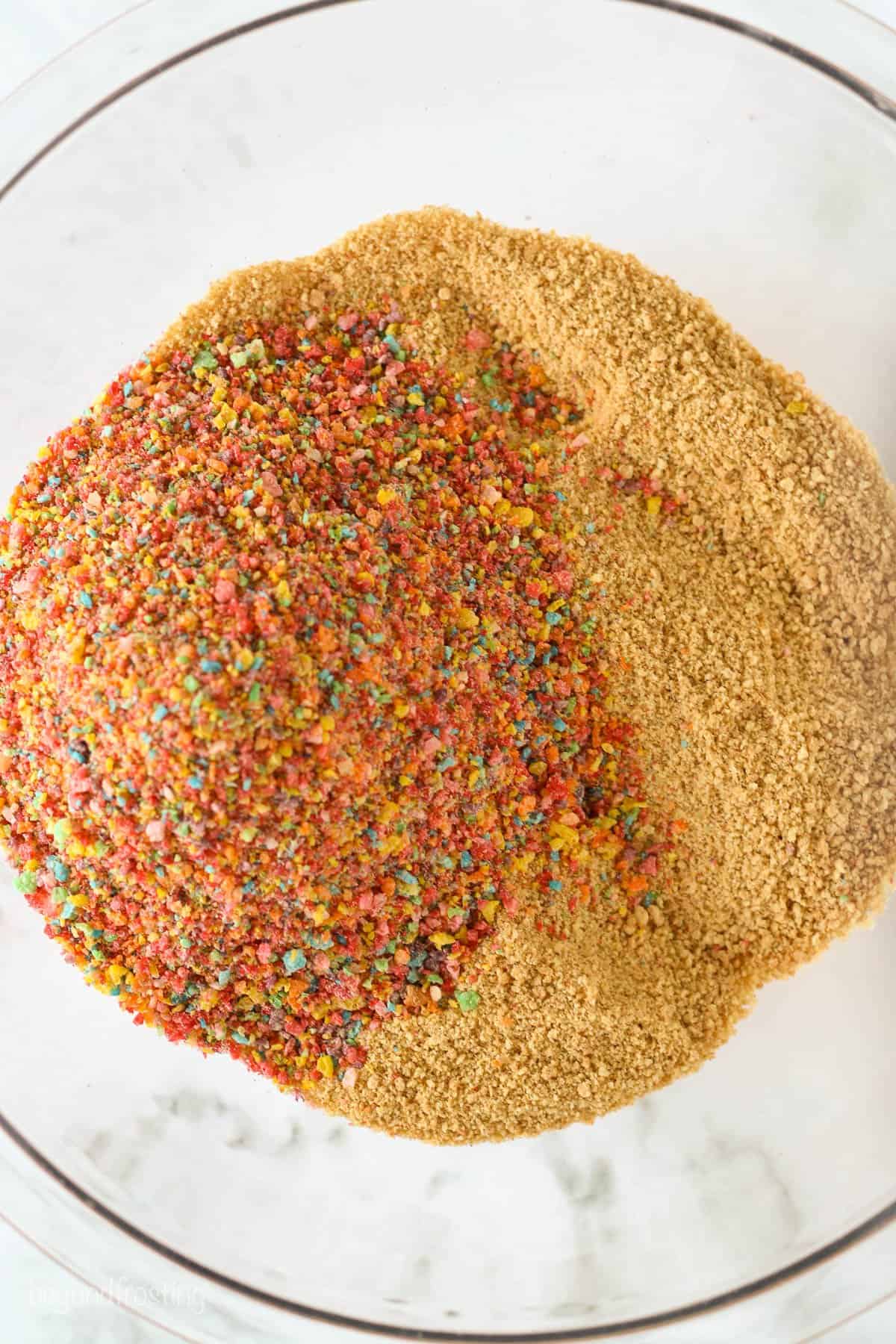 Fruity pebble and graham cracker crusts in a bowl