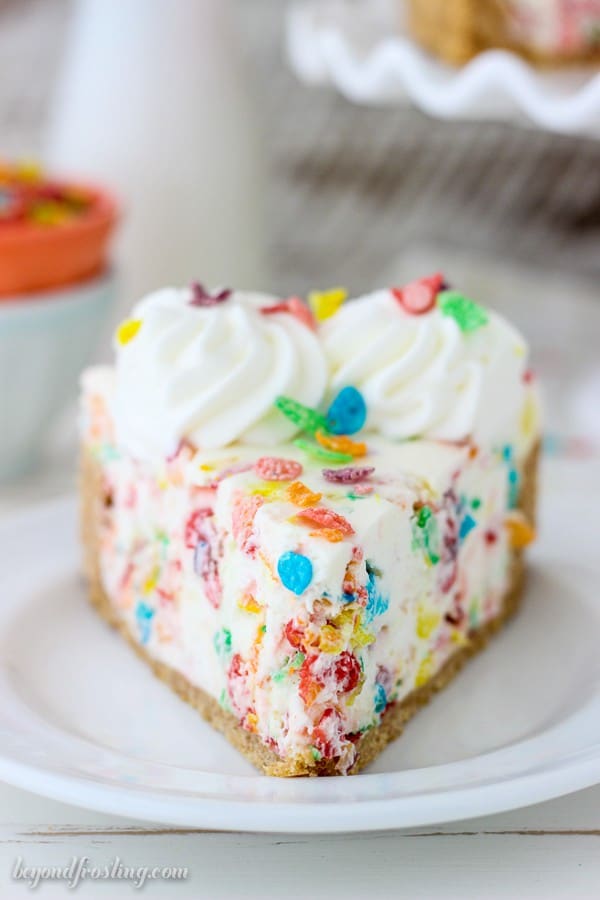 This No-Bake Fruity Pebbles Cheesecake is fun, festive and full of fruity flavors. The no-bake cheesecake filling is loaded with Fruity Pebbles on a Nilla Wafer crust.