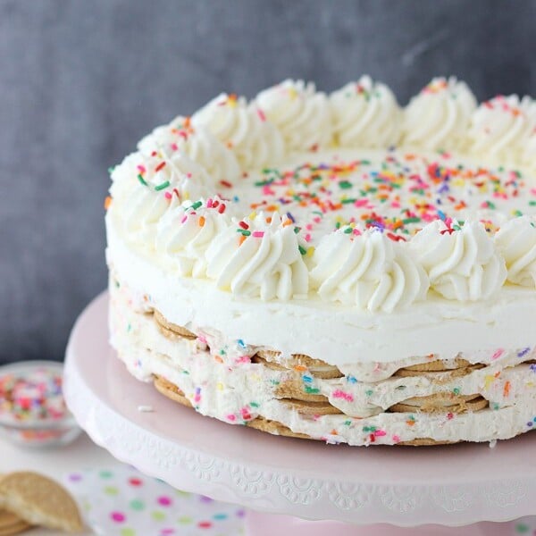 Summertime is not complete with No-Bake Oreo Funfetti Icebox Cake! Layers of Golden Oreos, Funfetti Mousse and whipped cream.