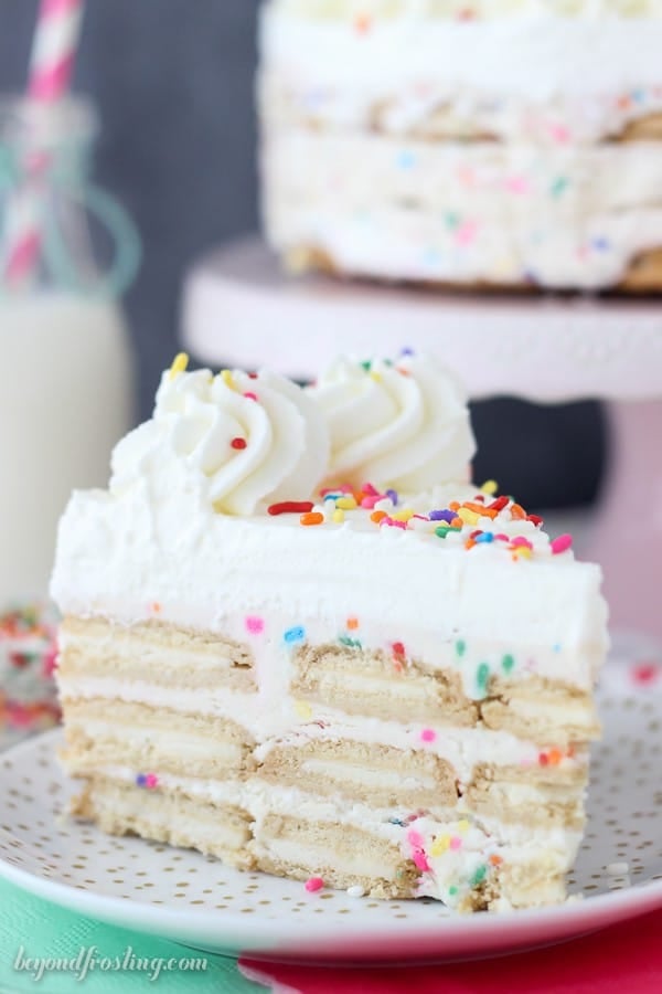 Summertime is not complete with No-Bake Oreo Funfetti Icebox Cake! Layers of Golden Oreos, Funfetti Mousse and whipped cream. 