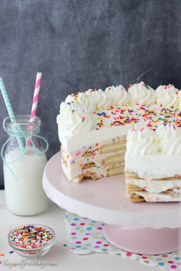 Summertime is not complete with No-Bake Oreo Funfetti Icebox Cake! Layers of Golden Oreos, Funfetti Mousse and whipped cream. 