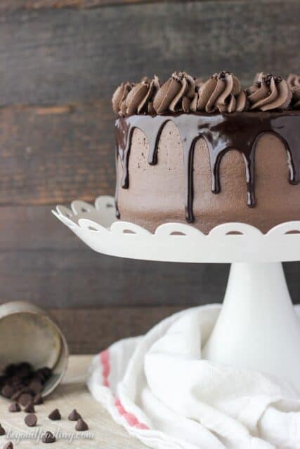 This Chocolate Mudslide Cake is what dreams are made of. The decadent chocolate cake is baked with Kahlua, and frosted with a Kahlua chocolate buttercream. It’s finished with a Bailey’s spiked chocolate ganache. This is one recipe you’ll be craving for weeks.