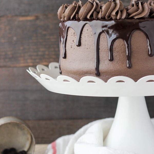 This Chocolate Mudslide Cake is what dreams are made of. The decadent chocolate cake is baked with Kahlua, and frosted with a Kahlua chocolate buttercream. It’s finished with a Bailey’s spiked chocolate ganache. This is one recipe you’ll be craving for weeks.