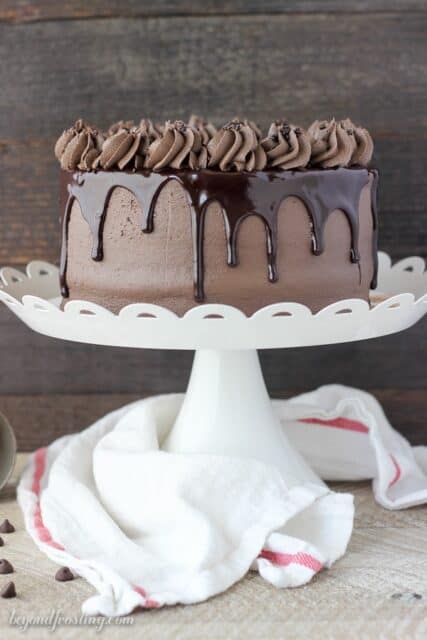 This Chocolate Mudslide Cake is loaded with chocolate, Kahlua and Bailey’s Irish Cream. The decadent chocolate cake is covered with a spiked buttercream and covered with ganache. You’d be surprised how easy this cake recipe is.