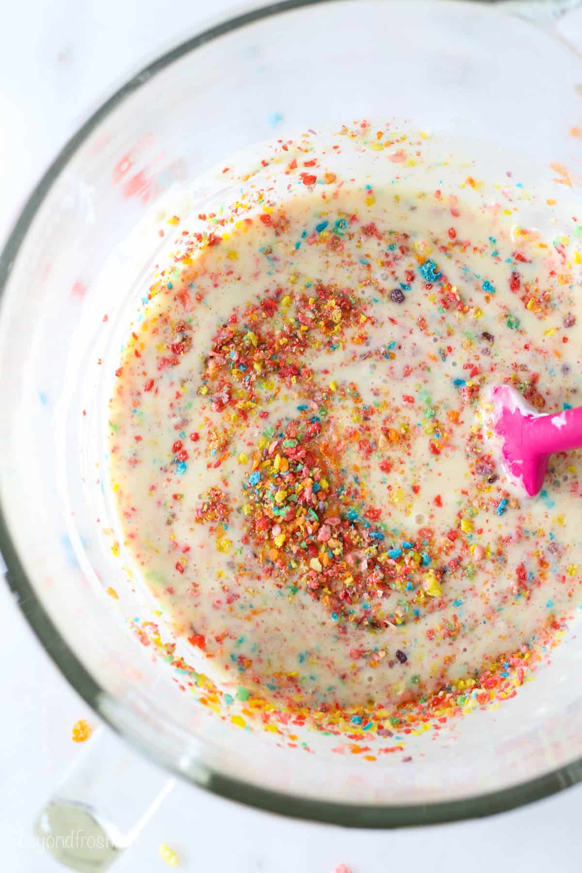 Fruity pebble cake batter in a mixing bowl