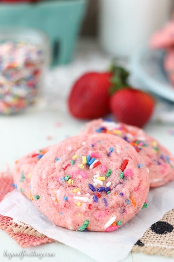 These Strawberry Funfetti Cake Mix Cookies are a chewy strawberry cookie made with cake mix and loaded with sprinkles. These are the perfect summer time cookies!