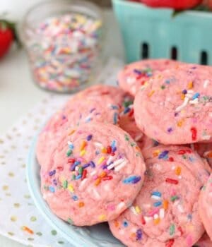 Take your funfetti cookies to the next level with the strawberry cake mix. These Strawberry Funfetti Cake Mix Cookies are so soft and chewy, they will be your new favorite cookie.