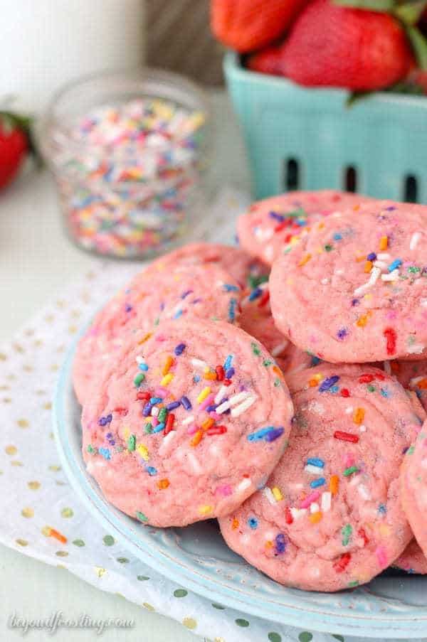 Take your funfetti cookies to the next level with the strawberry cake mix. These Strawberry Funfetti Cake Mix Cookies are so soft and chewy, they will be your new favorite cookie.