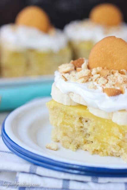 If you’re craving banana pudding, look no further. This Easy Banana Pudding Poke Cake starts with a doctored cake make using mashed bananas, brown sugar and buttermilk. Then it’s filled with a quick vanilla pudding and topped with bananas, whipped cream and Nilla wafers.