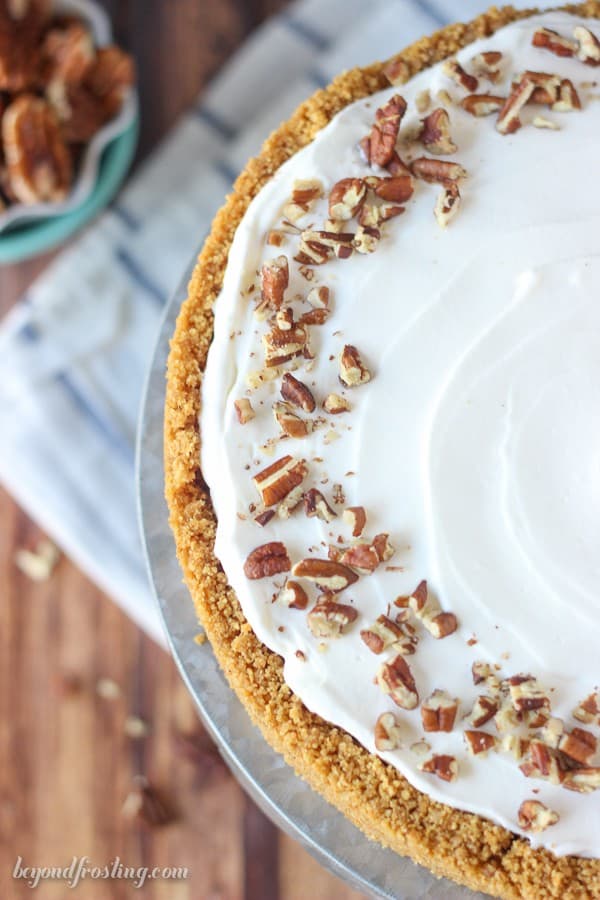 This No-Bake Bourbon Butterscotch Pudding Pie is a graham cracker crust, with a homemade butterscotch pudding spiked with bourbon and topped with a bourbon whipped cream.