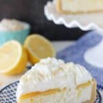 a slice of lemon and coconut cheesecake on a blue polka dot plate