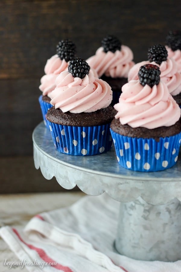 This cabernet-spiked chocolate cupcake is filled with fresh blackberries and topped with a silky blackberry frosting.