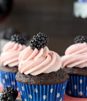 You're going to need more than one of the Blackberry Cabernet Cupcakes. These are a delicate chocolate cupcake spiked with cabernet and baked with fresh blackberries. It's topped with a silky blackberry frosting.
