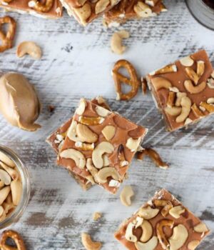Salty meets sweet in these No-Bake Butterscotch Bars. Layers of peanut butter, pretzels, butterscotch ganache and salty cashews. These bars are a great snack!