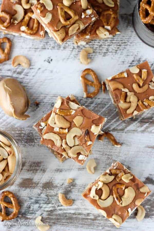 Salty meets sweet in these No-Bake Butterscotch Bars. Layers of peanut butter, pretzels, butterscotch ganache and salty cashews. These bars are a great snack!