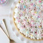 If you like cake batter, then you will love this homemade pie! The golden Oreo crust is filled with a from-scratch Funfetti pudding and topped with a cake atter whipped cream.