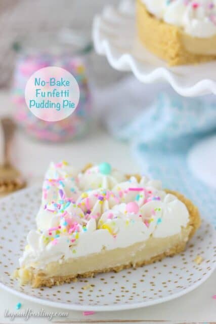 This homemade Funfetti Pudding Pie is a cake batter lover’s dream. The from-scratch Funfetti pudding is topped with a cake batter whipped cream. This pie is insanely delicious.