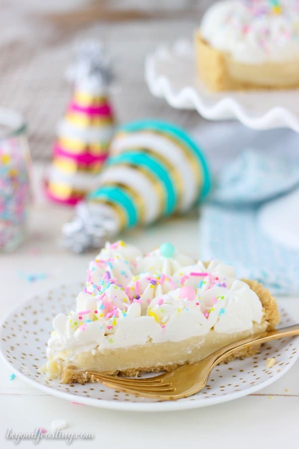 This homemade Funfetti Pudding Pie is a cake batter lover’s dream. The from-scratch Funfetti pudding is topped with a cake batter whipped cream. This pie is insanely delicious.