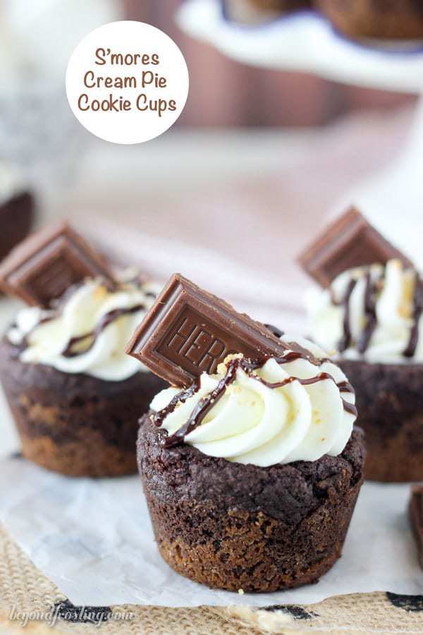 These S'mores Cream Pie Cookie Cups have an Oreo cookie crust with a soft chocolate pudding cookie, filled with a marshmallow mousse and topped with chocolate. 