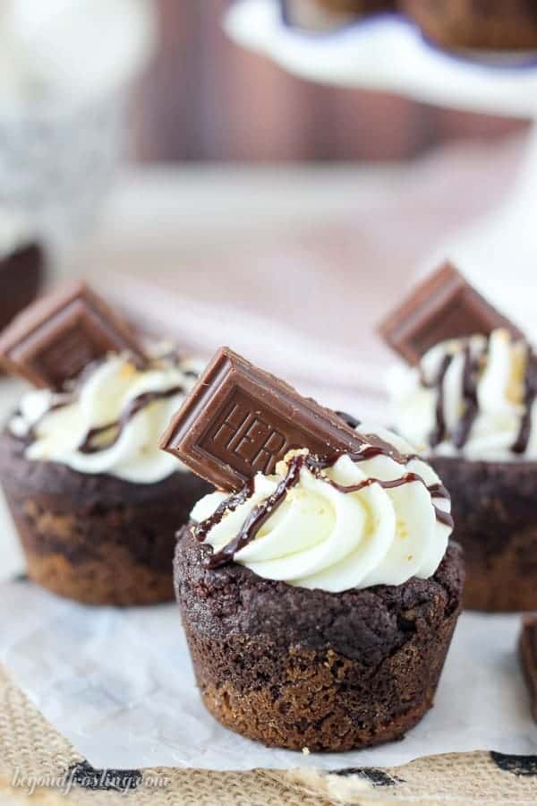 These S'mores Cream Pie Cookie Cups have an Oreo cookie crust with a soft chocolate pudding cookie, filled with a marshmallow mousse and topped with chocolate.