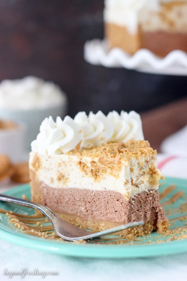 This No-Bake Chocolate Nutter Butter Mousse Pie is a Nutter Butter cookie crust with a thick layer of chocolate mousse, a layer of peanut butter cookie mousse and topped with whipped cream and more peanut butter.