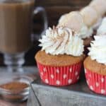 Pumpkin Tiramisu Cupcakes are the most popular fall cupcakes. This spiced pumpkin cupcake is soaked with espresso and bourbon and filled with a pumpkin mascarpone mousse. These are topped with a mascarpone whipped cream, cocoa powder and a ladyfinger.