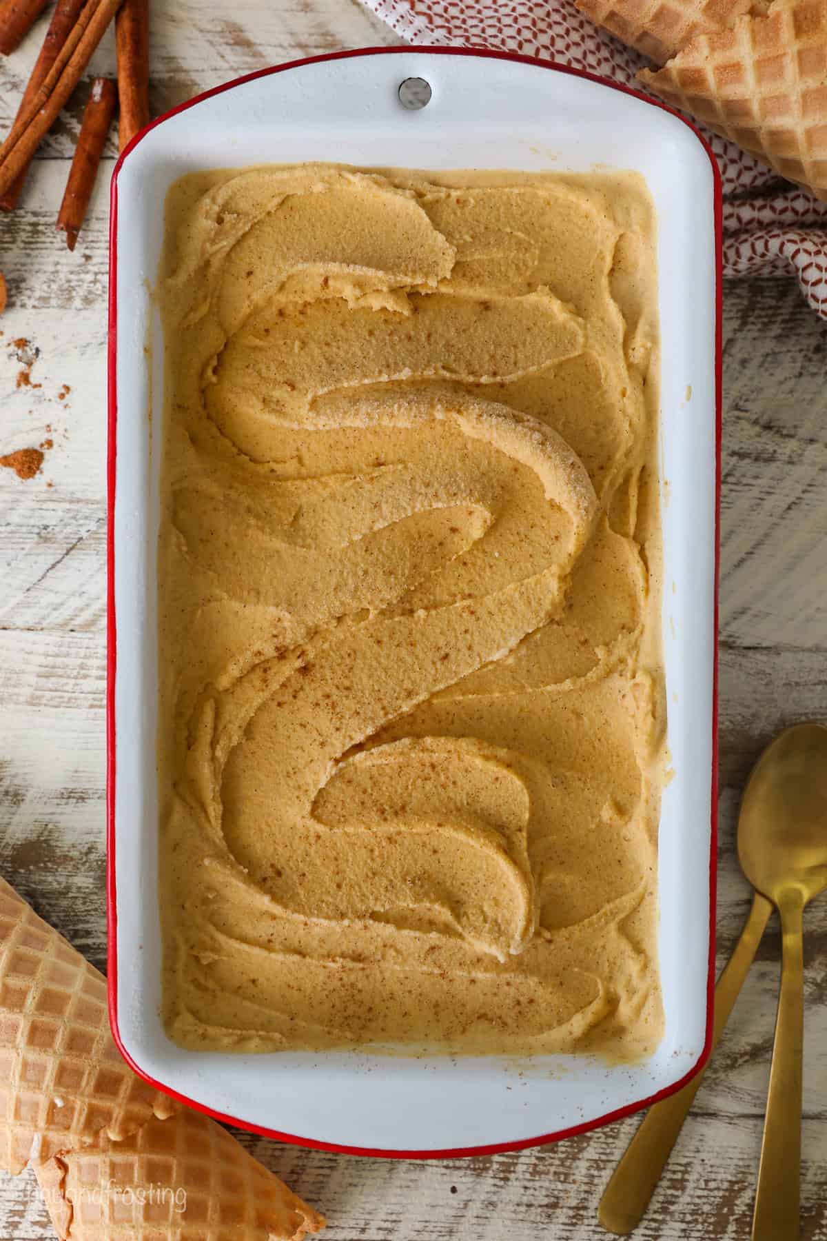 Overhead view of homemade pumpkin pie ice cream in a loaf pan.