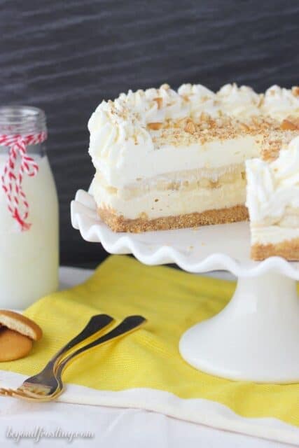 Banana Pudding Cheesecake on a white cake stand