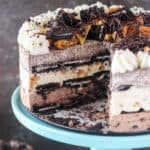 A slutty brookie icebox cake with a slice missing