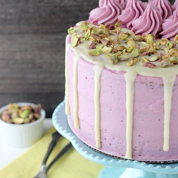 This homemade white chocolate cake is covered with a fresh blueberry frosting. The combination of flavors in the Blueberry Pistachio Cake are absolutely perfect. It’s covered with a white chocolate ganache and pistachios.